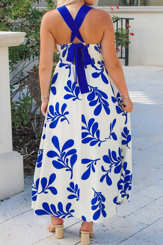 Robe longue sans manches avec imprimé floral bleu et dos noué croisé