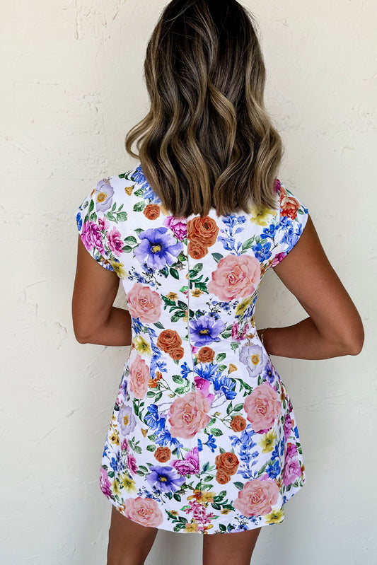 Mini-robe bleu ciel à manches courtes et imprimé floral éclatant