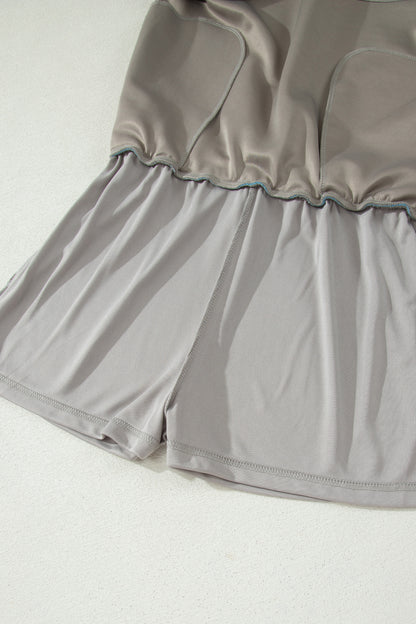 Ensemble 2 pièces jupe-short mini à cordon, veste zippée sport vert fumée à bord contrastant