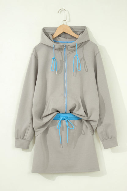 Ensemble 2 pièces jupe-short mini à cordon, veste zippée sport vert fumée à bord contrastant