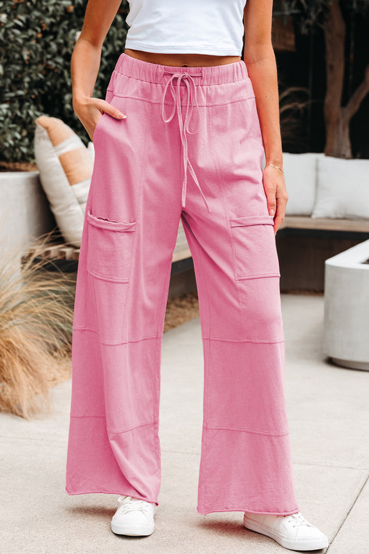 Pantalon cargo large en bonbon délavé avec coutures apparentes et taille élastique à cordon de serrage