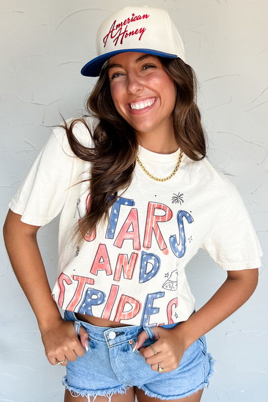 T-shirt graphique ras du cou blanc avec étoiles et rayures